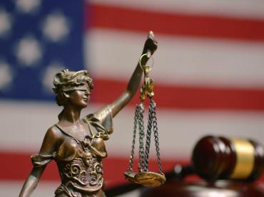 Figure of Lady Justice, with scales. Source: Share My Lesson.